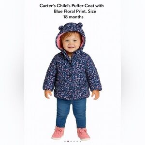 Carters Child’s Puffer Coat with Blue Floral Print. Size 18 months.
